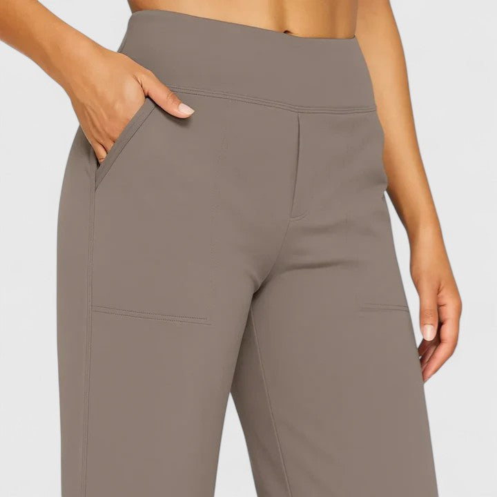 Professional women's pull-on pants with pockets, ensuring comfort and a chic appearance for work.