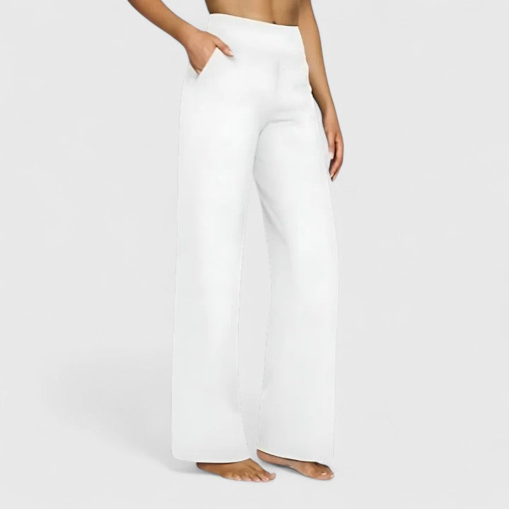 Chic women's pull-on pants with pockets, perfect for versatile sophisticated casual or professional wear.
