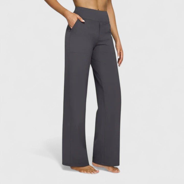 Elegant women's pull-on pants with a sleek design and essential pockets, suitable for work or leisure.