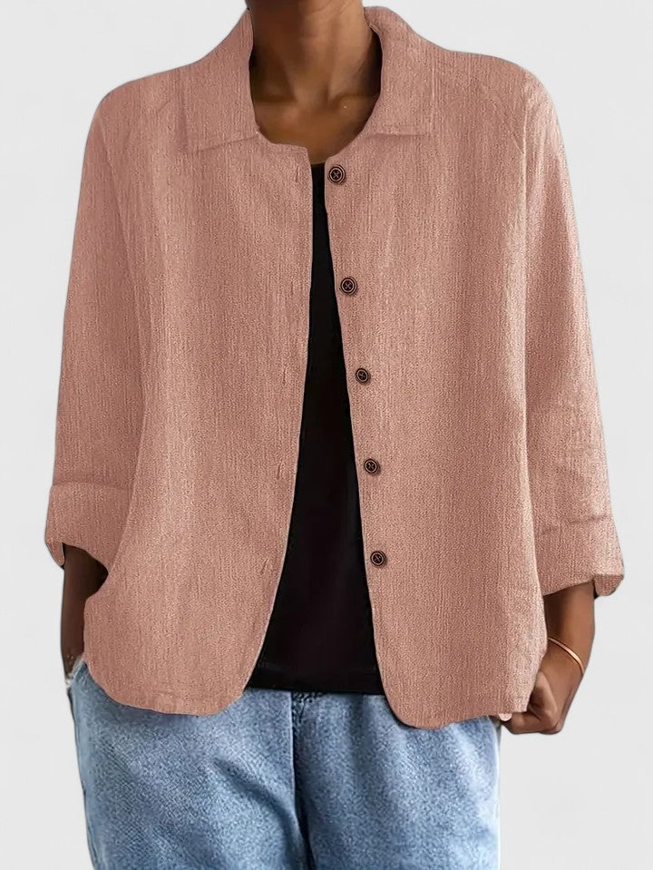Women's sophisticated versatile long sleeve top, perfect for elegant casual or chic workwear style.