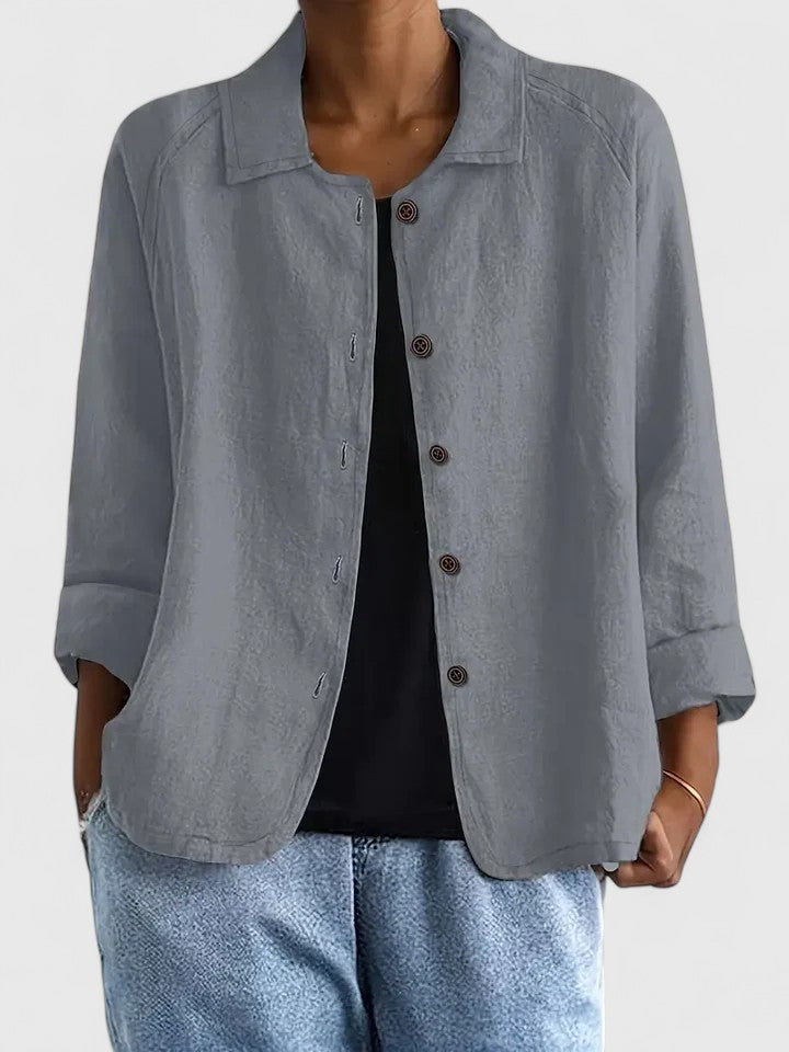 Elegant women's long sleeve top, ideal for a sophisticated layered all-season outfit.