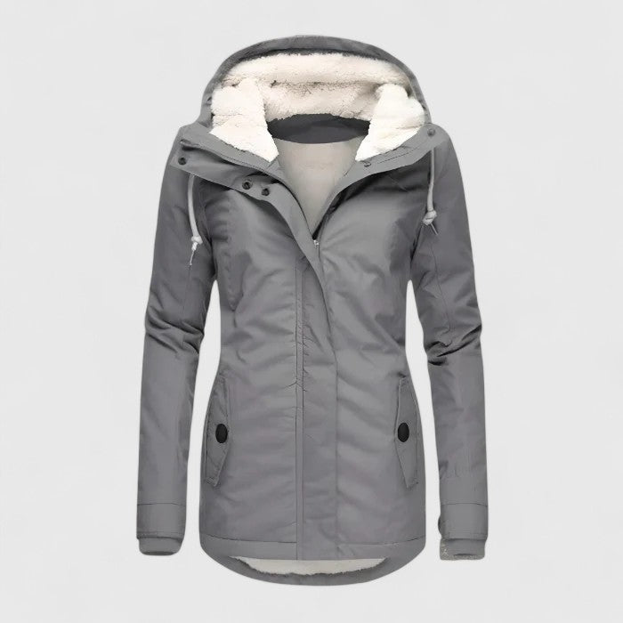 Elegant women's waterproof outerwear, a stylish hooded jacket for ultimate weather protection.