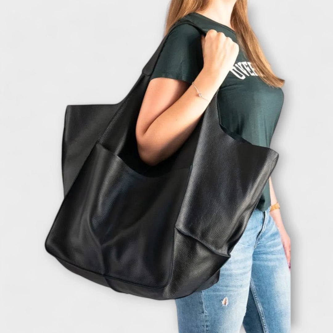 Versatile women's faux leather tote bag, elegant & roomy, perfect for office or shopping.