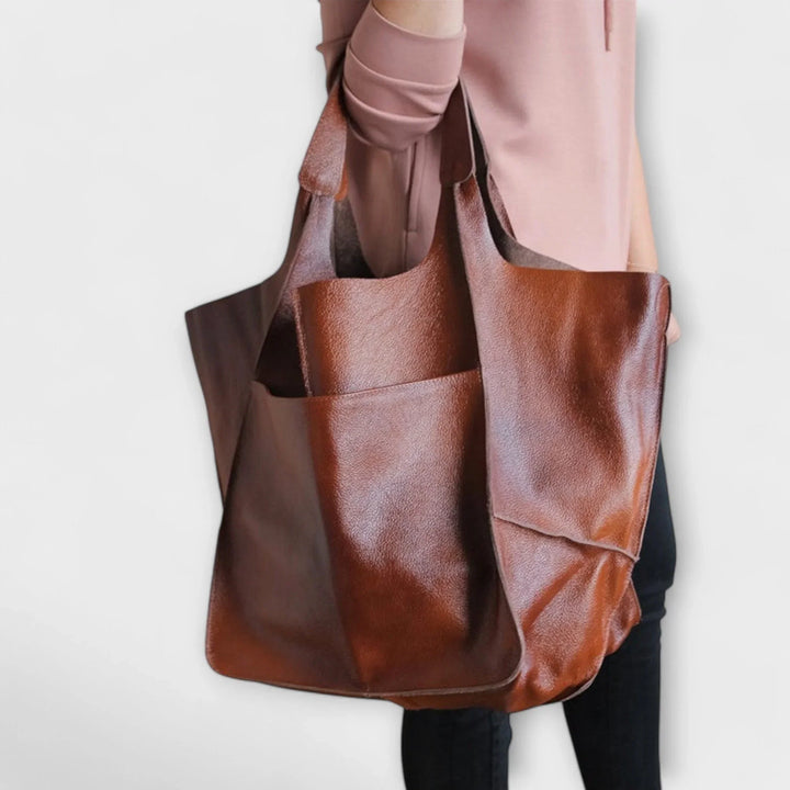 Durable faux leather ladies' tote bag with ample space for essentials, everyday style.