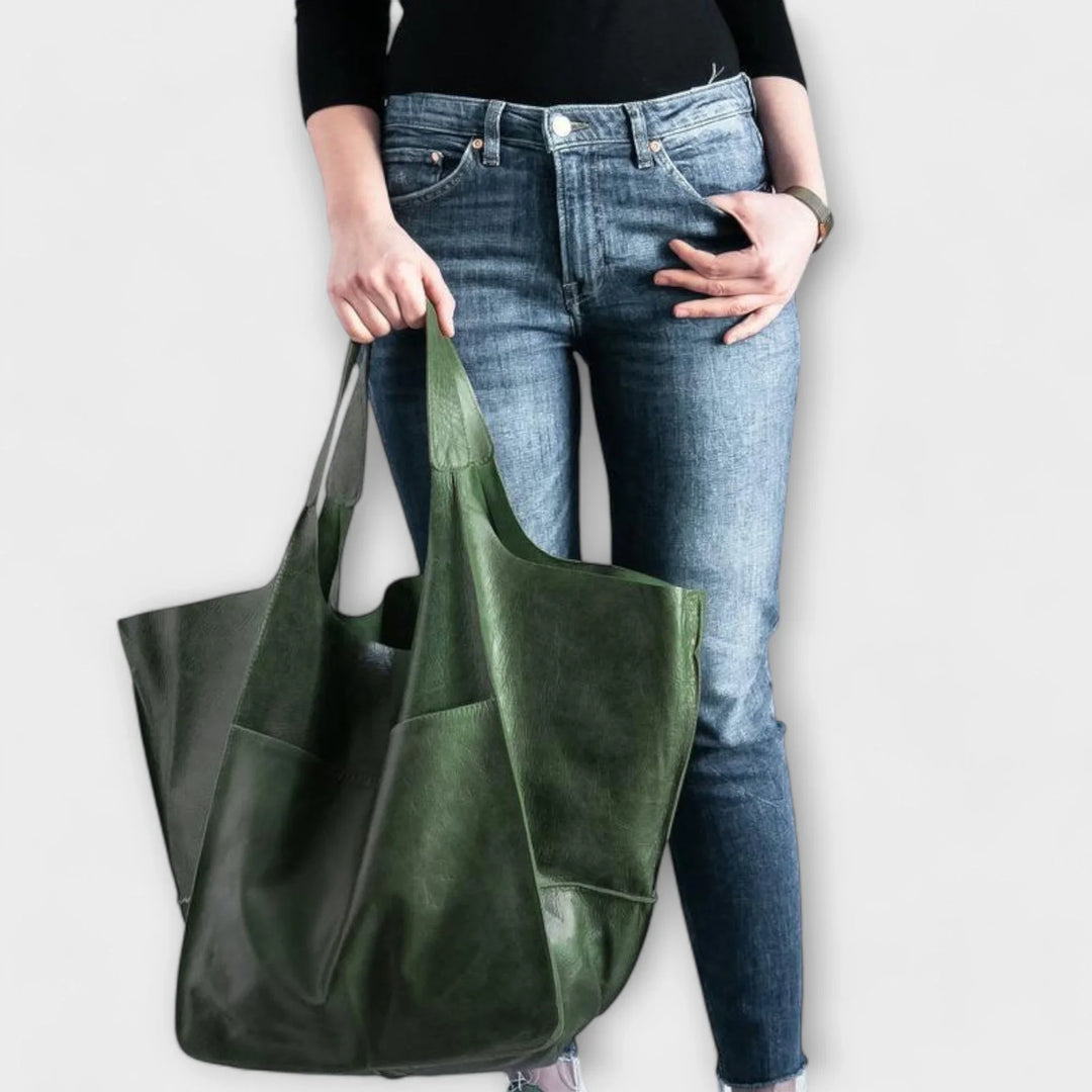 Classic black faux leather tote bag for women, spacious & elegant, a timeless everyday accessory.