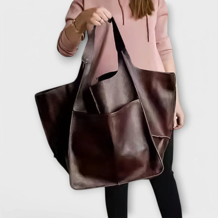 Brown faux leather shoulder tote bag for women, spacious, versatile, & ideal for everyday use.