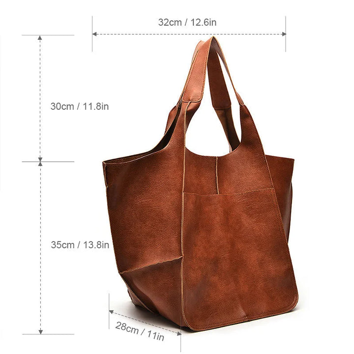 Faux leather tote bag for women, spacious interior & elegant design, suitable for all occasions.