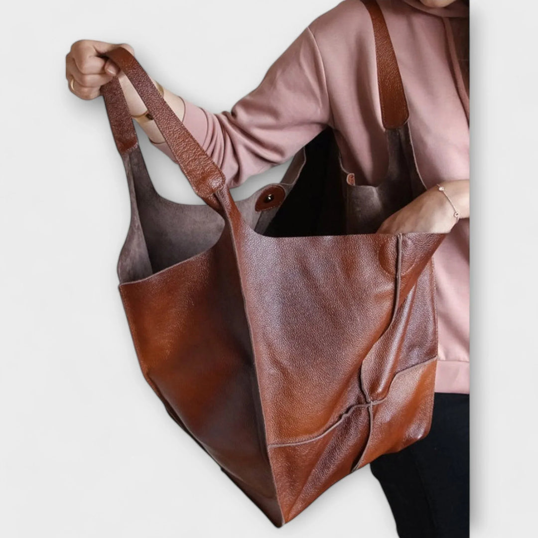 Modern minimalist faux leather tote bag for women, practical & chic for daily use.