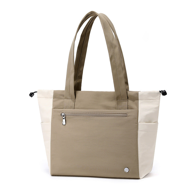 Women's spacious & stylish everyday tote bag, perfect as a versatile shoulder bag for work or travel.