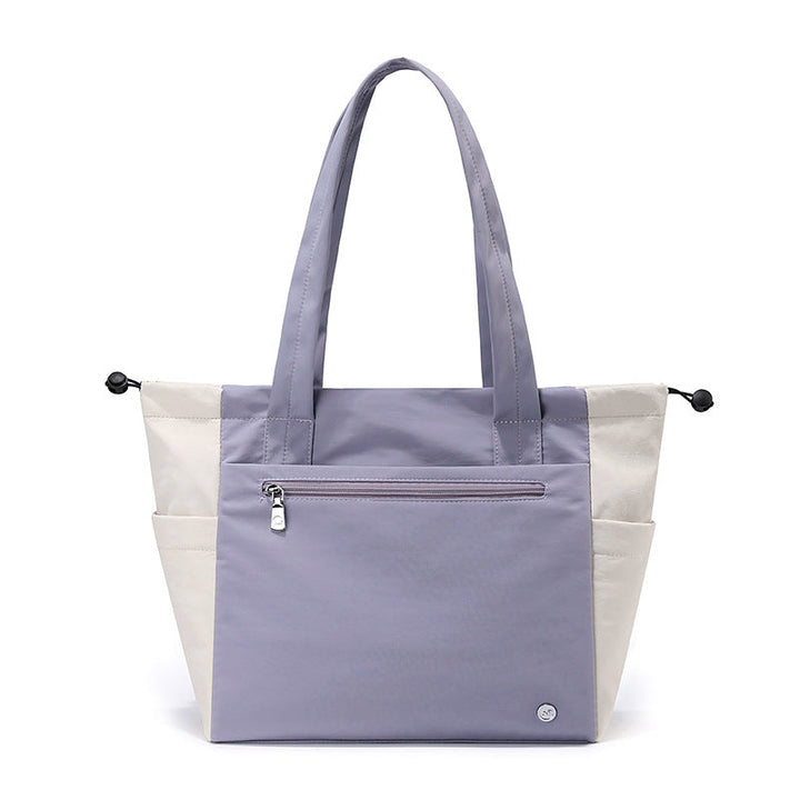 Elegant multi-functional women's tote bag, a spacious carryall ideal for daily use, work, or travel.