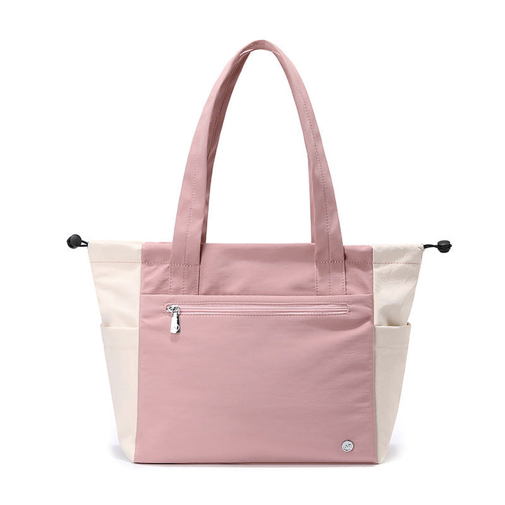 Fashionable women's everyday tote bag with comfortable straps, a versatile and spacious shoulder bag.