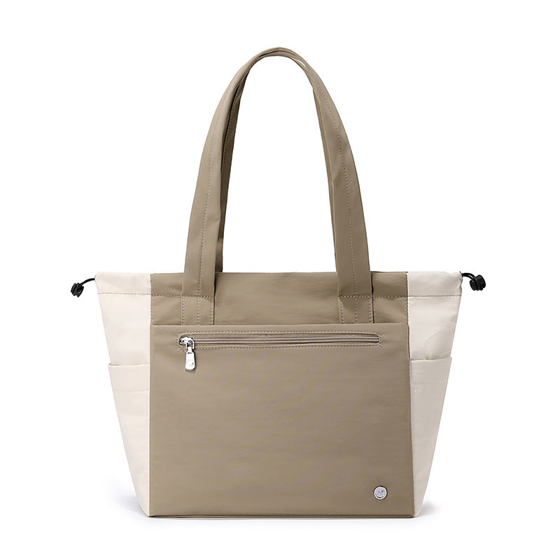 Versatile women's tote bag, perfect as a spacious everyday carryall for errands, work, or travel.