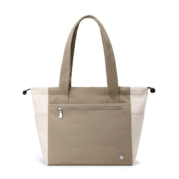 Versatile women's tote bag, perfect as a spacious everyday carryall for errands, work, or travel.