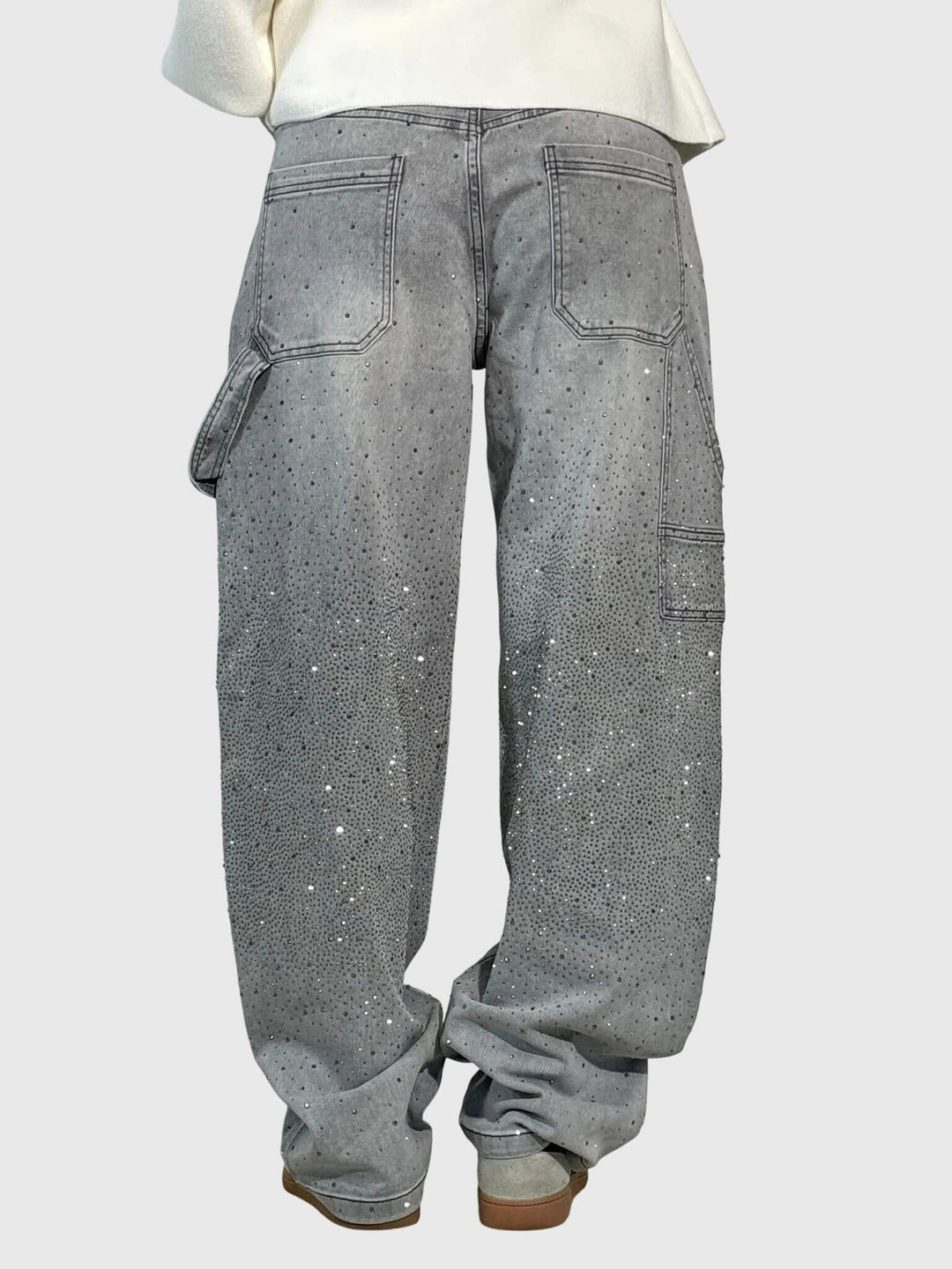 Back view of women's high-rise wide-leg pants, showcasing the graceful drape and diamond sparkle.