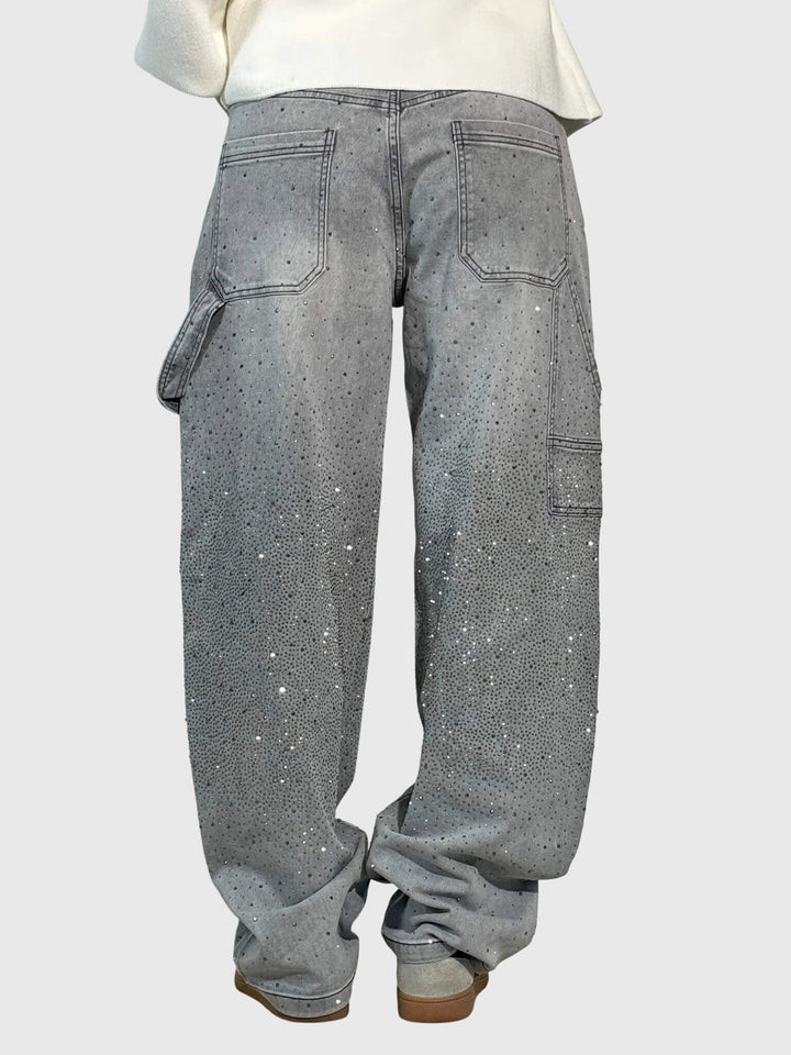 Back view of women's high-rise wide-leg pants, showcasing the graceful drape and diamond sparkle.