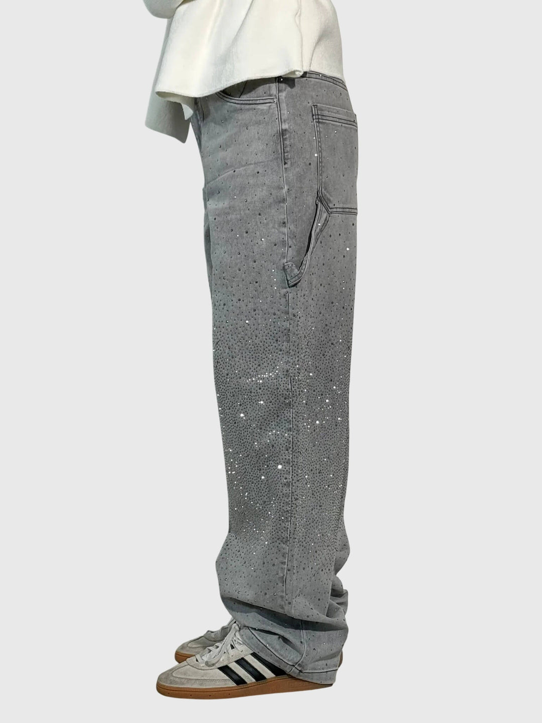 Detailed shot of the sparkle diamond pattern on women's wide-leg pants, emphasizing quality.