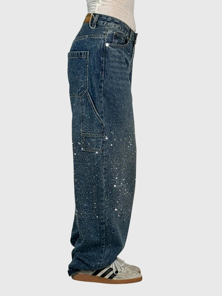 High-rise wide-leg women's pants with dazzling diamond sparkle, a comfortable statement piece.