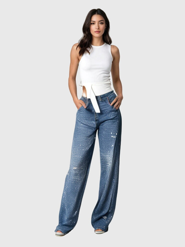 Glamorous women's wide-leg pants with all-over diamond sparkle, ideal for evening wear.