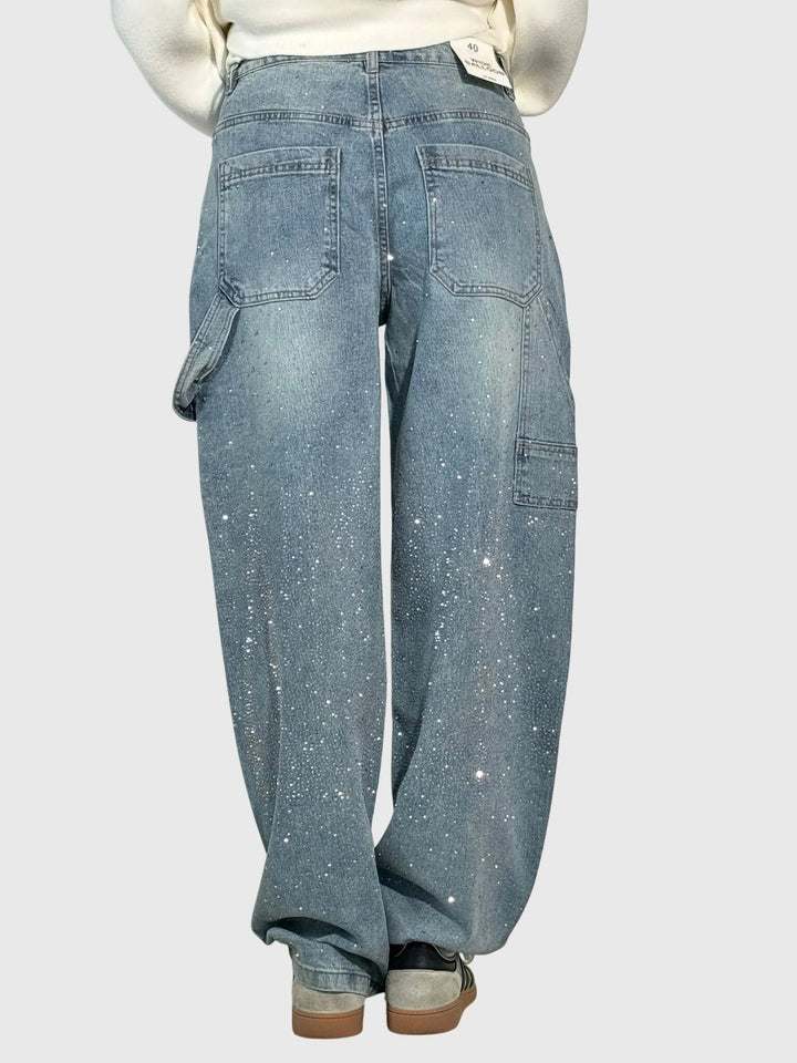 Full shot of women's shimmer wide-leg pants, showcasing their elegant drape and dazzling sparkle.