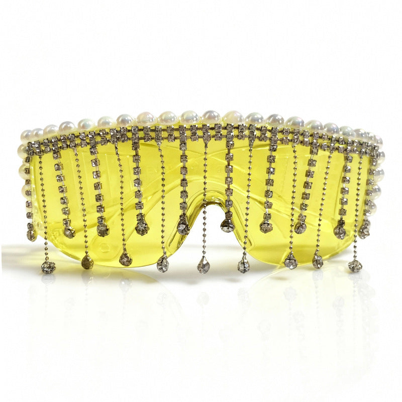 Elegant women's fashion sunglasses adorned with sparkling rhinestones. Provides stylish UV protection. A chic accessory.