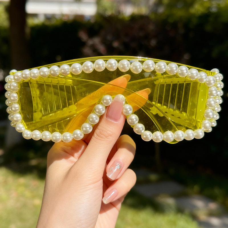 Trendy women's bejeweled sunglasses, a sparkling fashion statement. Glamorous eyewear for summer style & party glasses.