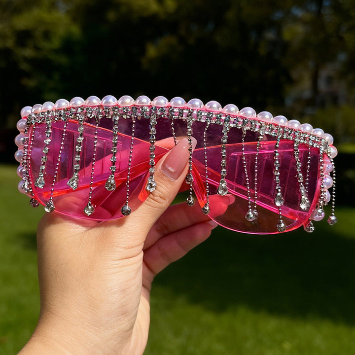 Dazzling women's bejeweled sunglasses. A sparkling fashion accessory for a glamorous summer look. Trendy UV shades.