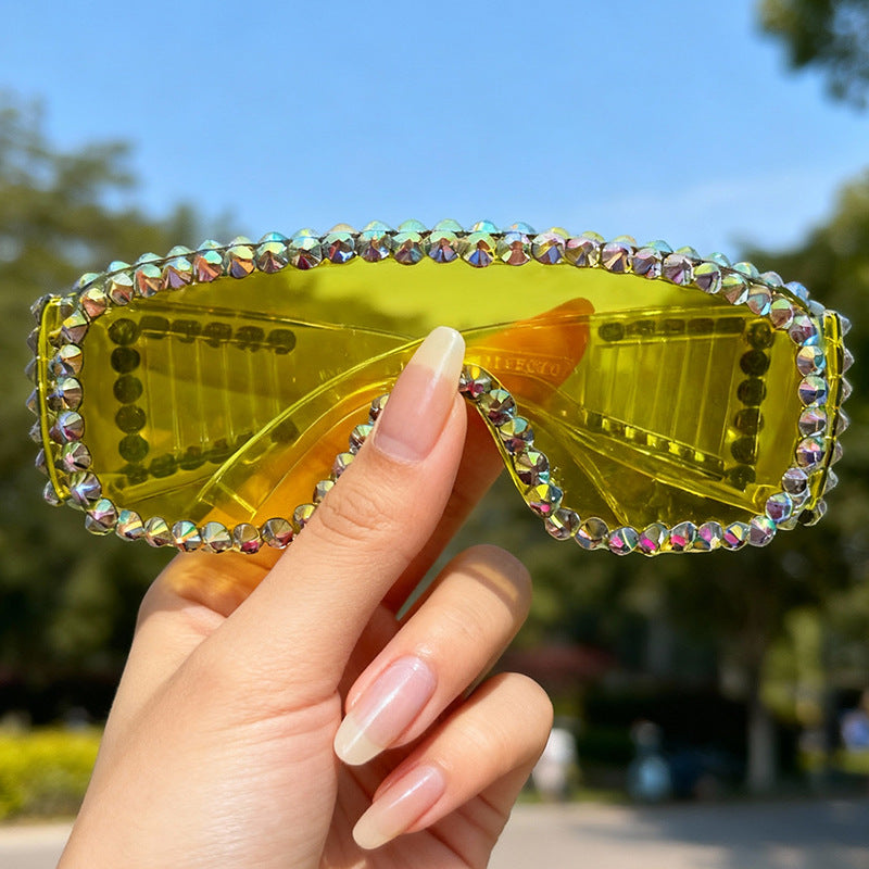 Chic women's bejeweled fashion sunglasses. Sparkling rhinestones make these trendy party glasses with UV protection.