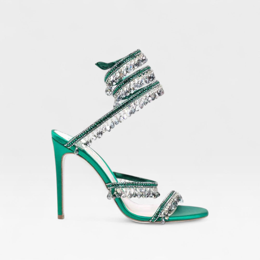 Stylish women's sparkling crystal strappy sandals, elegant high heels for evening wear.