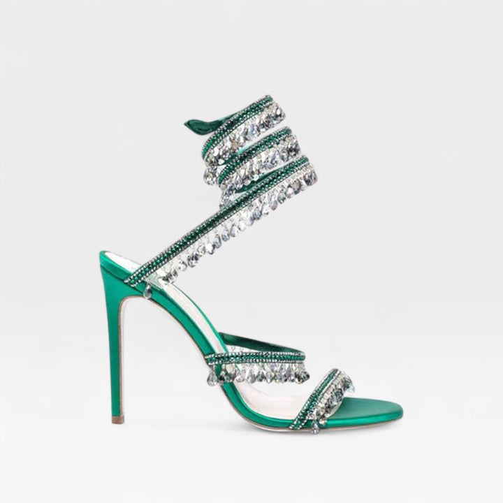 Stylish women's sparkling crystal strappy sandals, elegant high heels for evening wear.