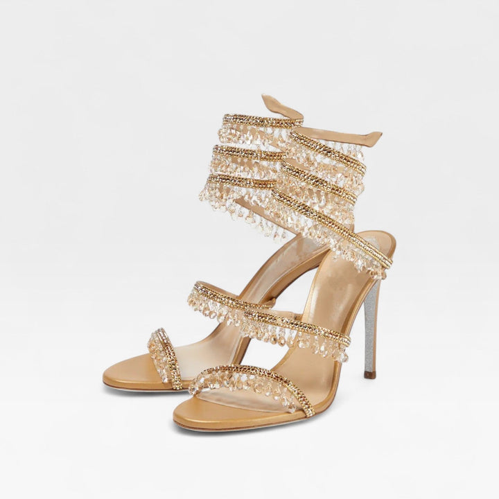 Elegant women's sparkling crystal strappy sandals, glamorous high heels for luxury style.