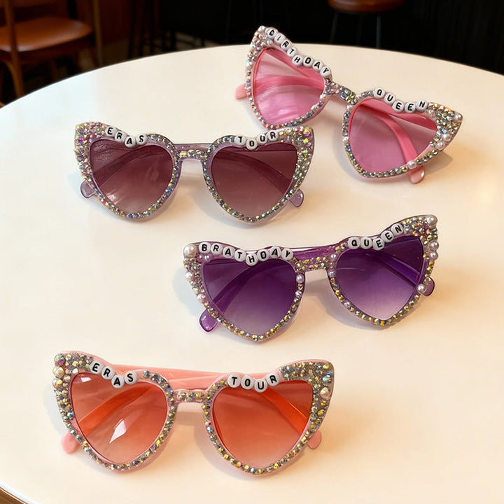 Dazzling rhinestone heart sunglasses, a glamorous women's party accessory offering stylish UV400 eye protection.