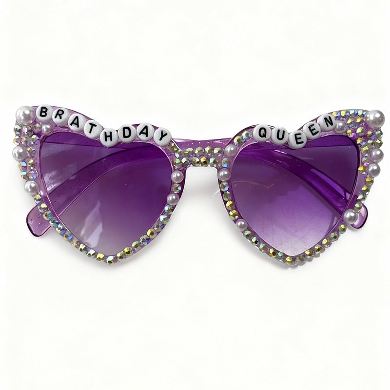 Sparkling rhinestone heart sunglasses for women. Trendy eye protection with UV400 for glamorous style.