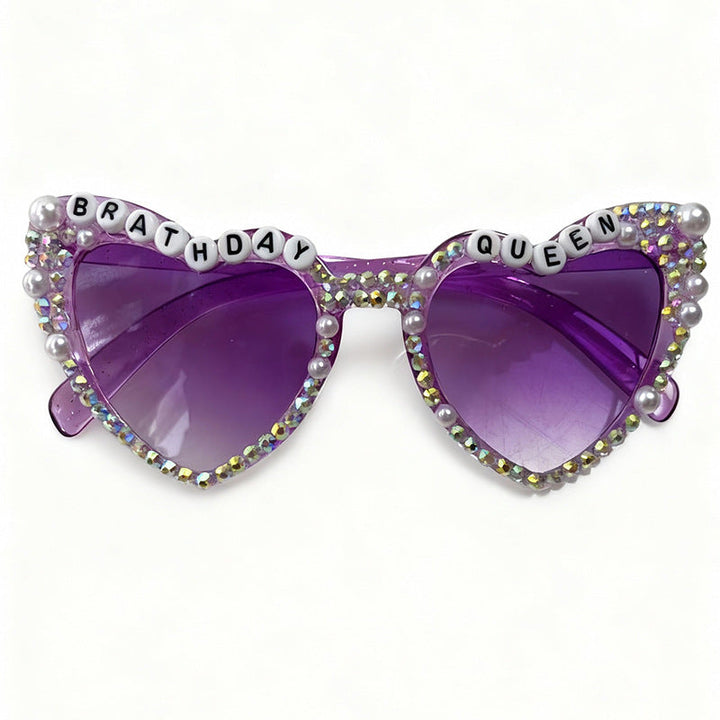 Sparkling rhinestone heart sunglasses for women. Trendy eye protection with UV400 for glamorous style.
