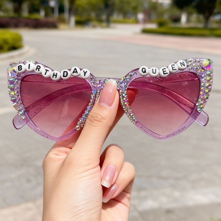 Women's sparkling heart-shaped rhinestone sunglasses for fashion & party, offering UV protection.