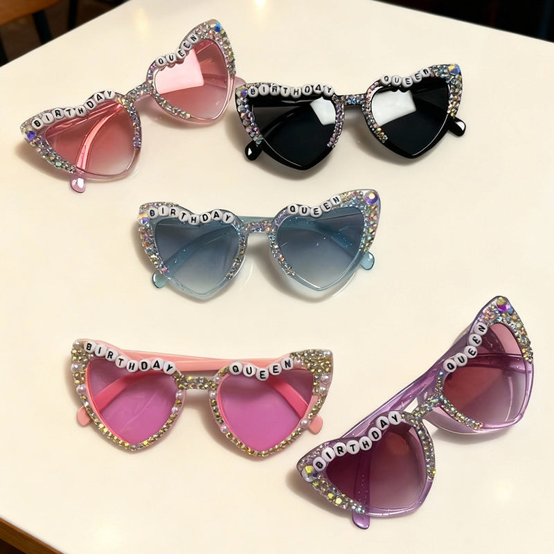 Trendy heart rhinestone sunglasses for women, perfect sparkling party eyewear with UV protection.
