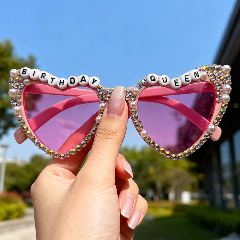 Women's dazzling heart-shaped rhinestone sunglasses, a chic & trendy fashion statement.