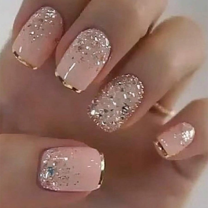 Women's sparkling nail art kit for DIY glitter and metallic nail designs. Create unique, creative manicures.
