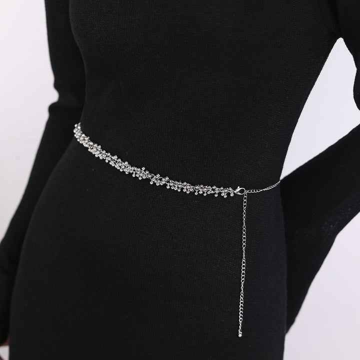 Sparkling adjustable rhinestone chain belt for women, a versatile fashion accessory adding bling to any dress.