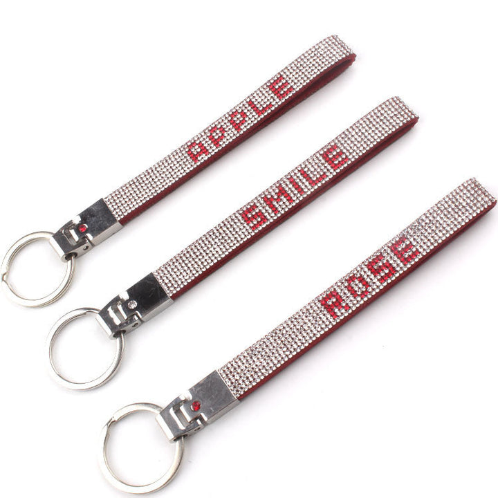 Glamorous rhinestone key accessory, perfect women's bag charm with brilliant sparkle & design.