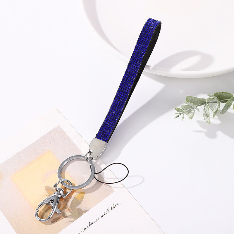 Elegant women's key holder adorned with sparkling rhinestones, a perfect gift for her.