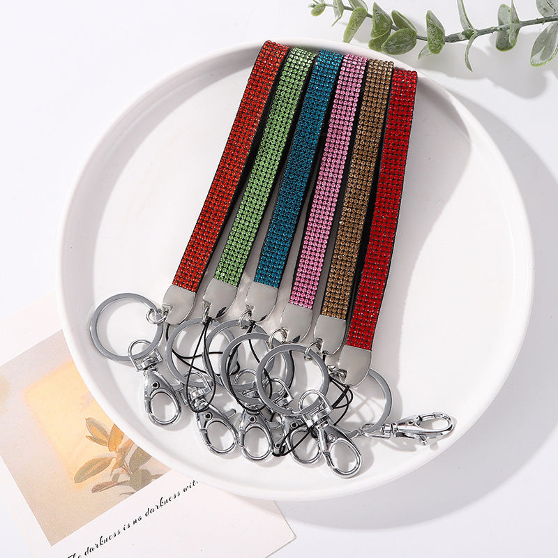 Close-up of a glamorous rhinestone key holder accessory for women, adding sparkle to keys.
