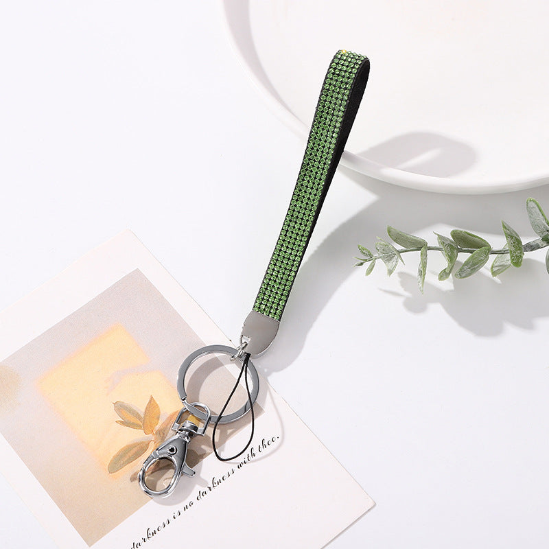 Elegant rhinestone key organizer, a sparkling accessory & bag charm for women's style.