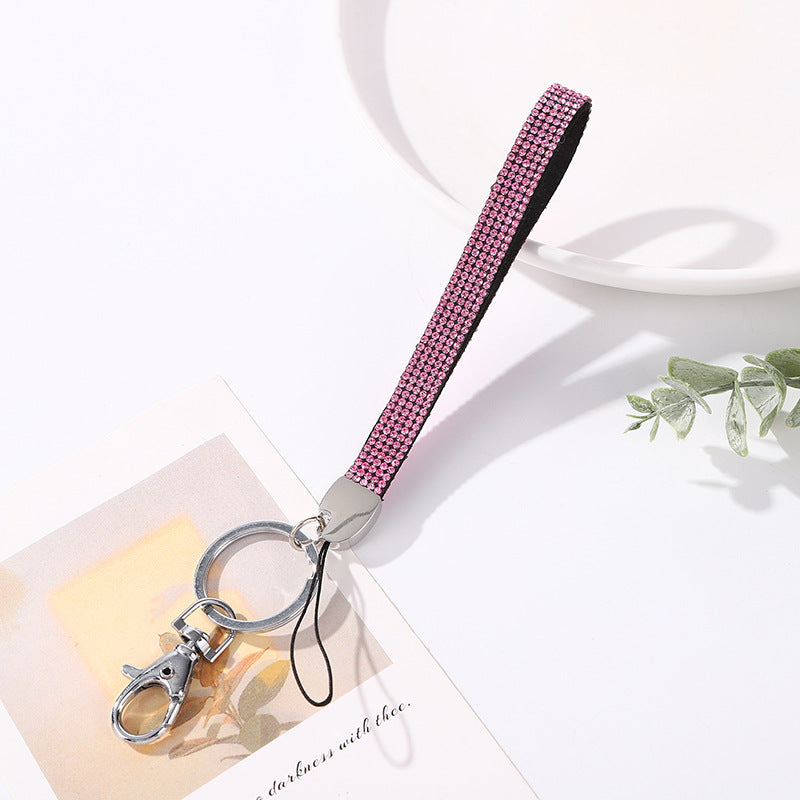Luxurious rhinestone bag charm and key holder, an elegant accessory for women's keys.