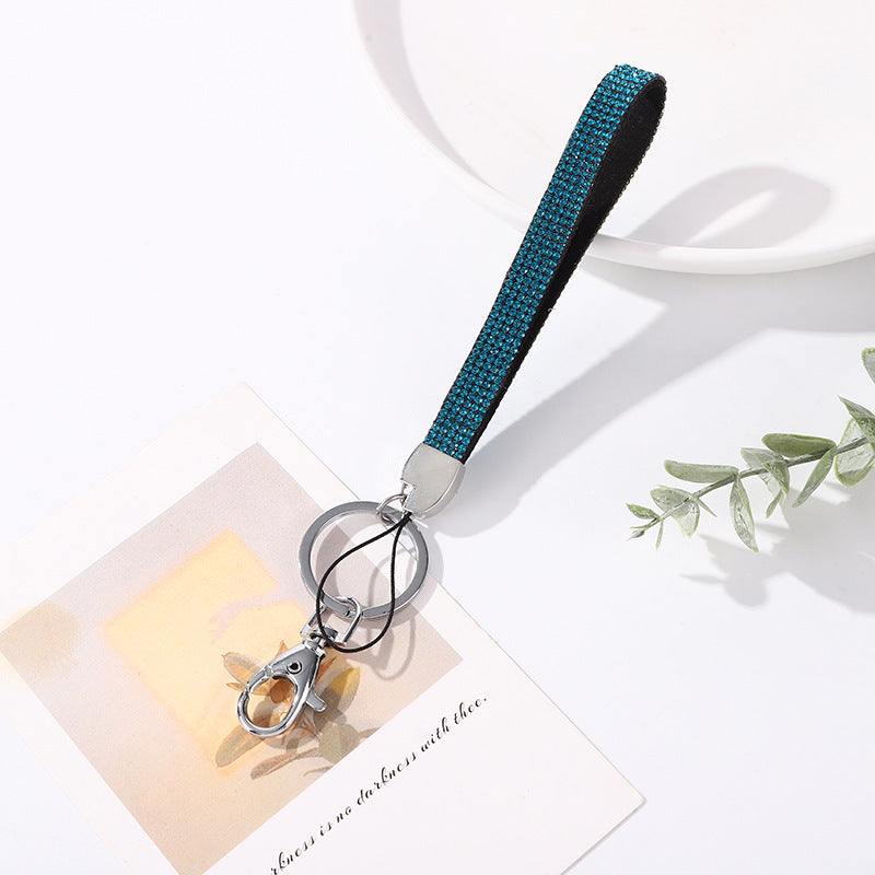 Sparkling women's keychain with brilliant rhinestones, a chic key organizer accessory.