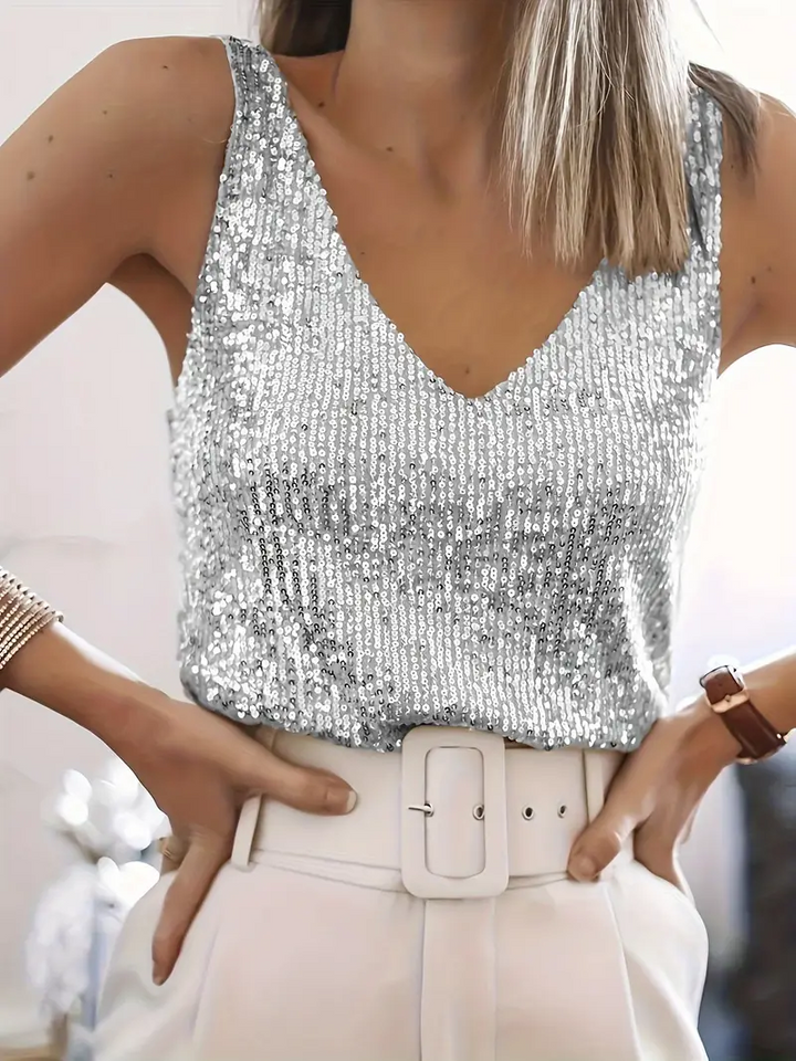Elegant women's sparkling sequin V-neck sleeveless blouse. Perfect for glamorous evening & party wear.