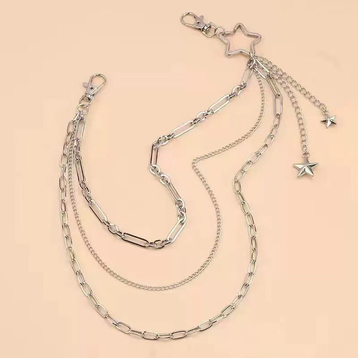 Adjustable women's chain belt with multiple shimmering star charms, a versatile statement accessory.