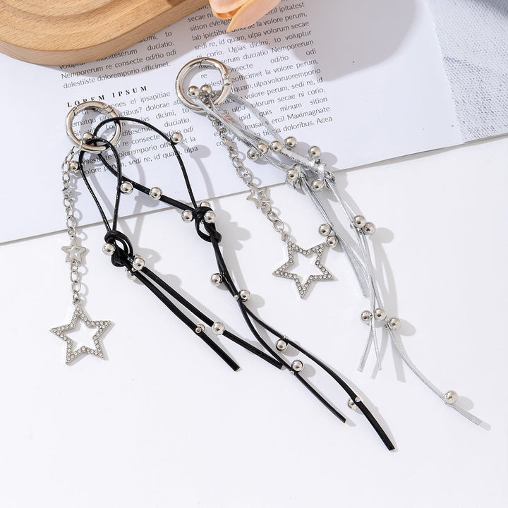 Women's sparkling star charm keychain; perfect fashion accessory for keys & bags.