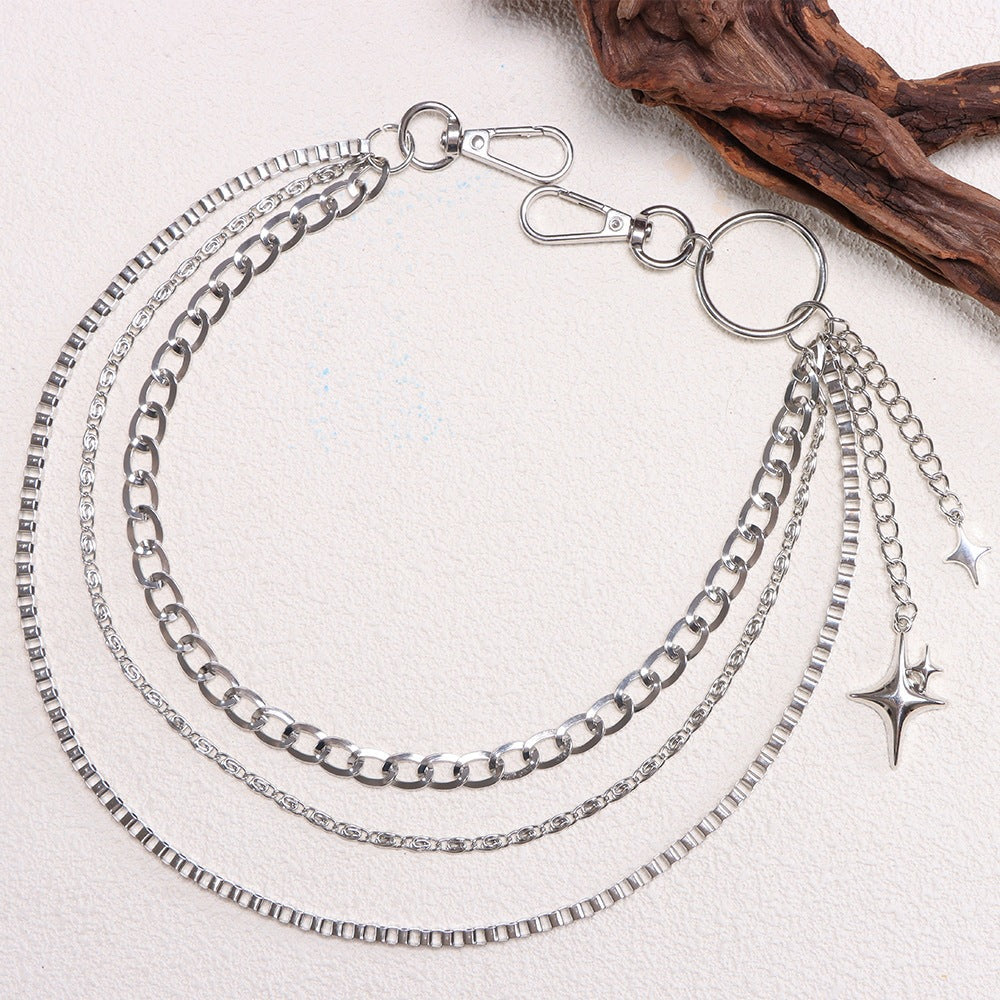 Shimmering star bag charm keychain for women, adds a sparkling touch to any handbag or purse. Fashion accessory.