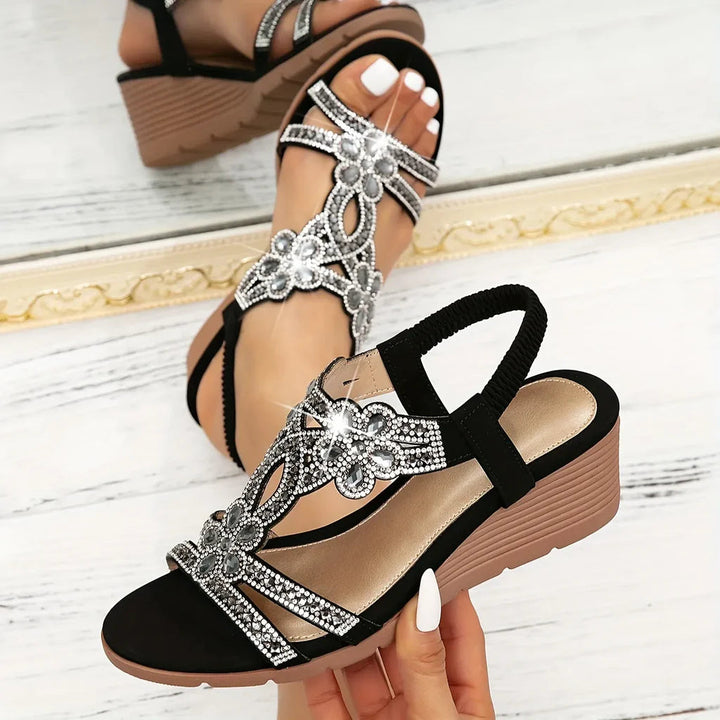 Elegant women's wedge sandals with rhinestones. Comfortable slip-on, open-toe design ideal for summer parties.