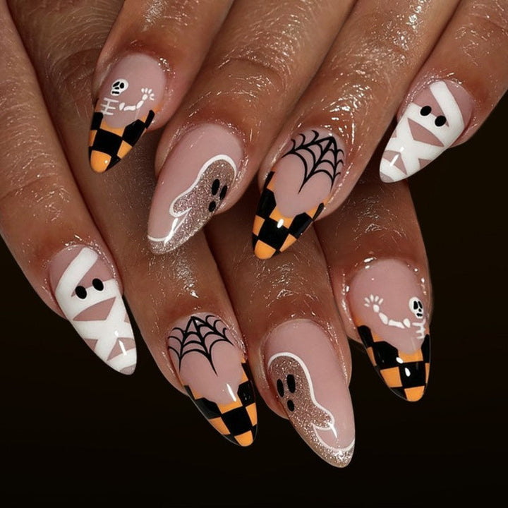Women's Spooky Halloween Nail Art Kit for festive manicure with ghost & spider web designs. DIY spooky nails.